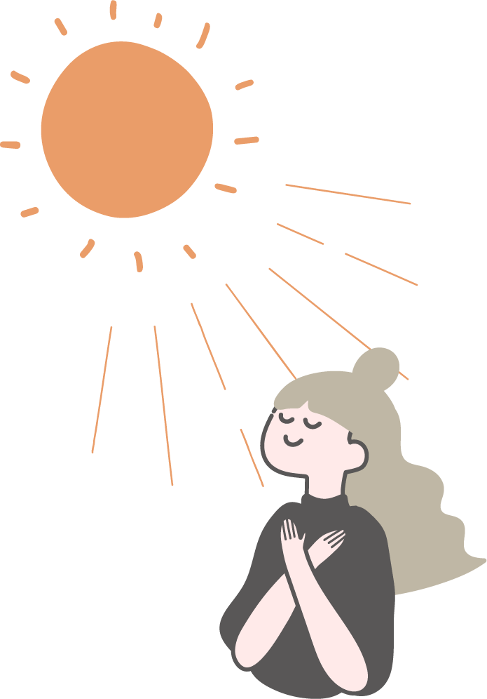 太陽光を浴びている女性